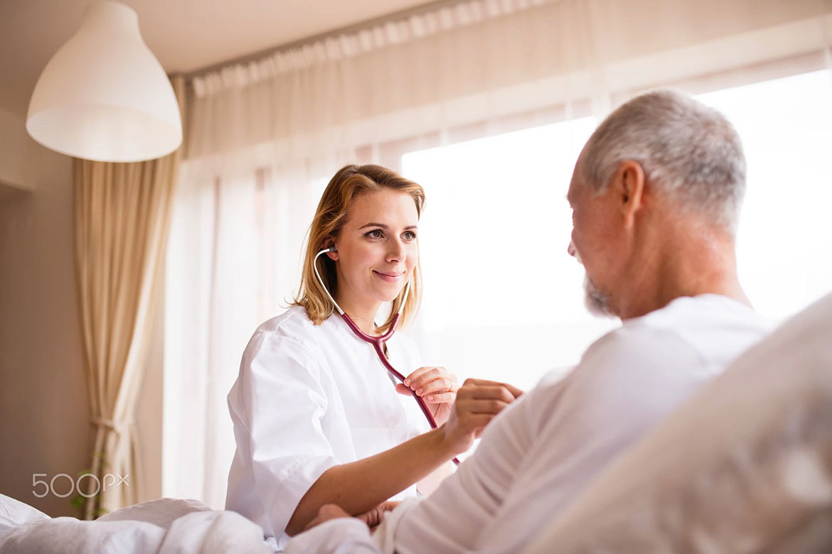 Licensed nurse providing skilled nursing care at home